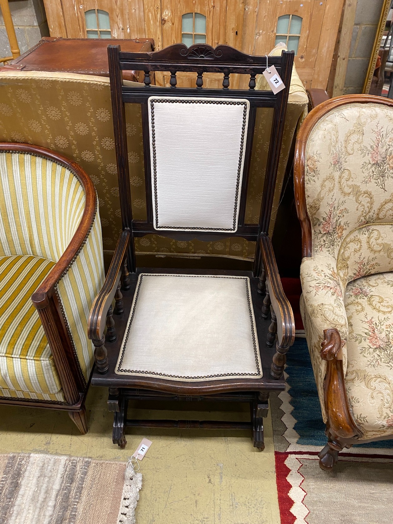 A late 19th century American rocking chair, width 56cm, depth 50cm, height 109cm